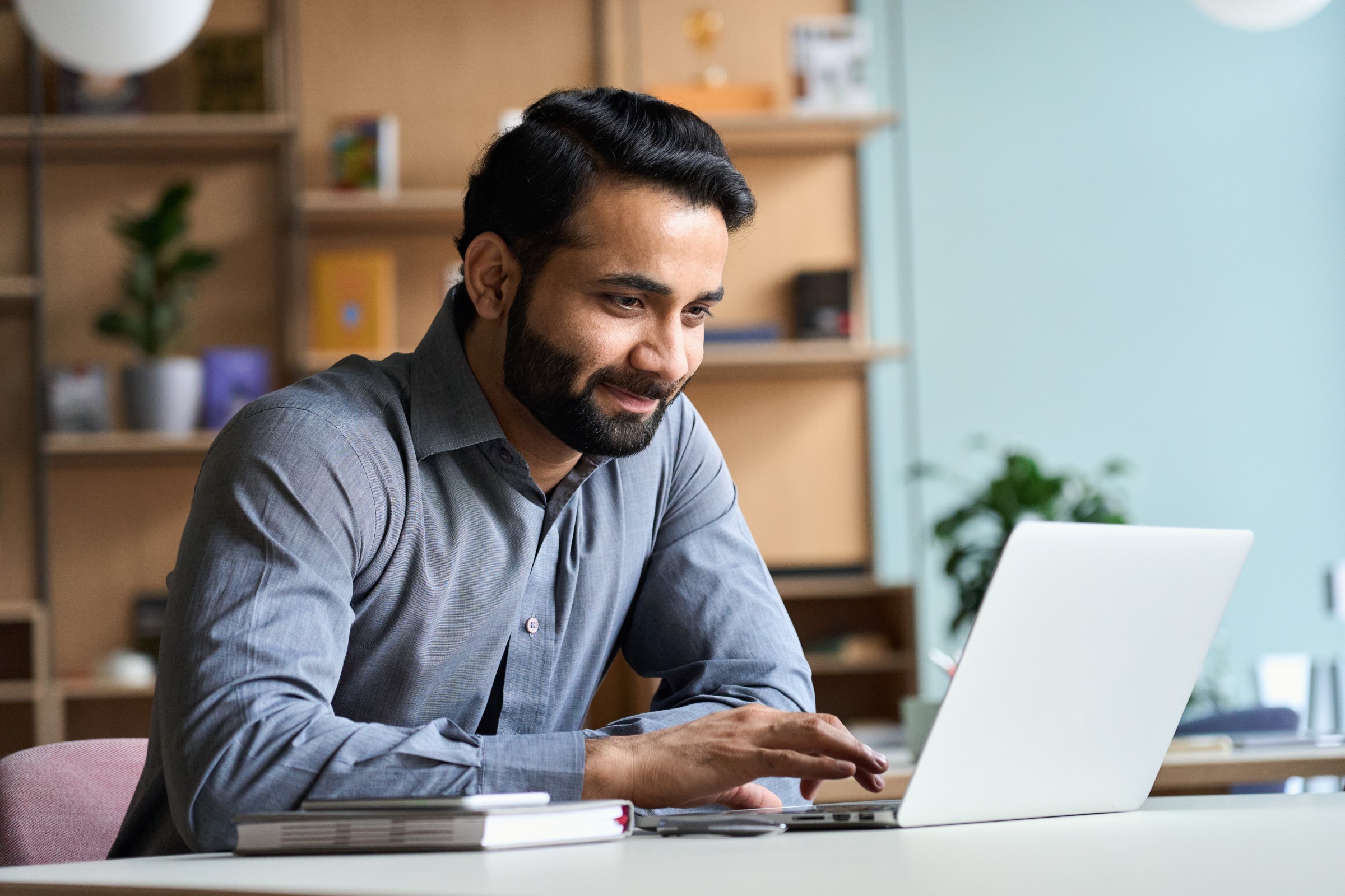 man focused on his computer